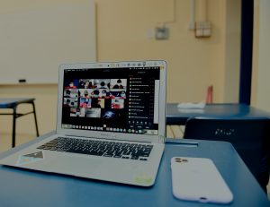 Laptop with a webinar showing