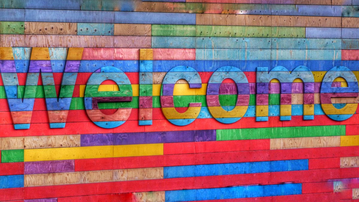 Multi-coloured welcome sign